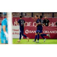 Louisville City FC's Jansen Wilson and Elijah Wynder on the field