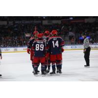 Allen Americans Patrick Polino and Brayden Guy celebrate goal with team